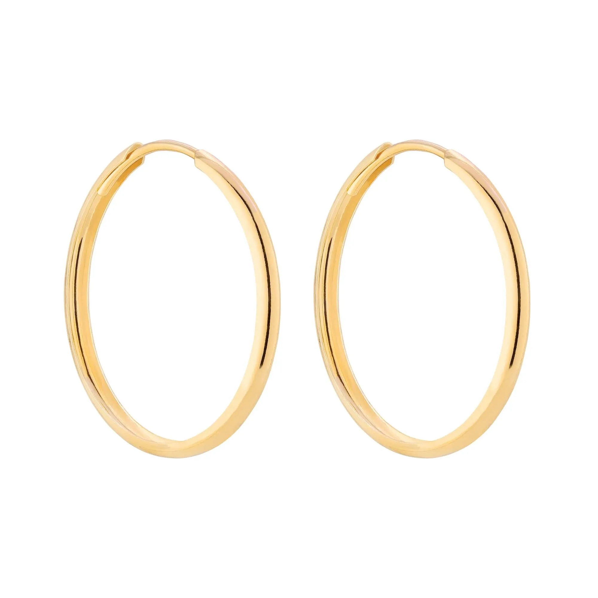 Złote kolczyki grube koła