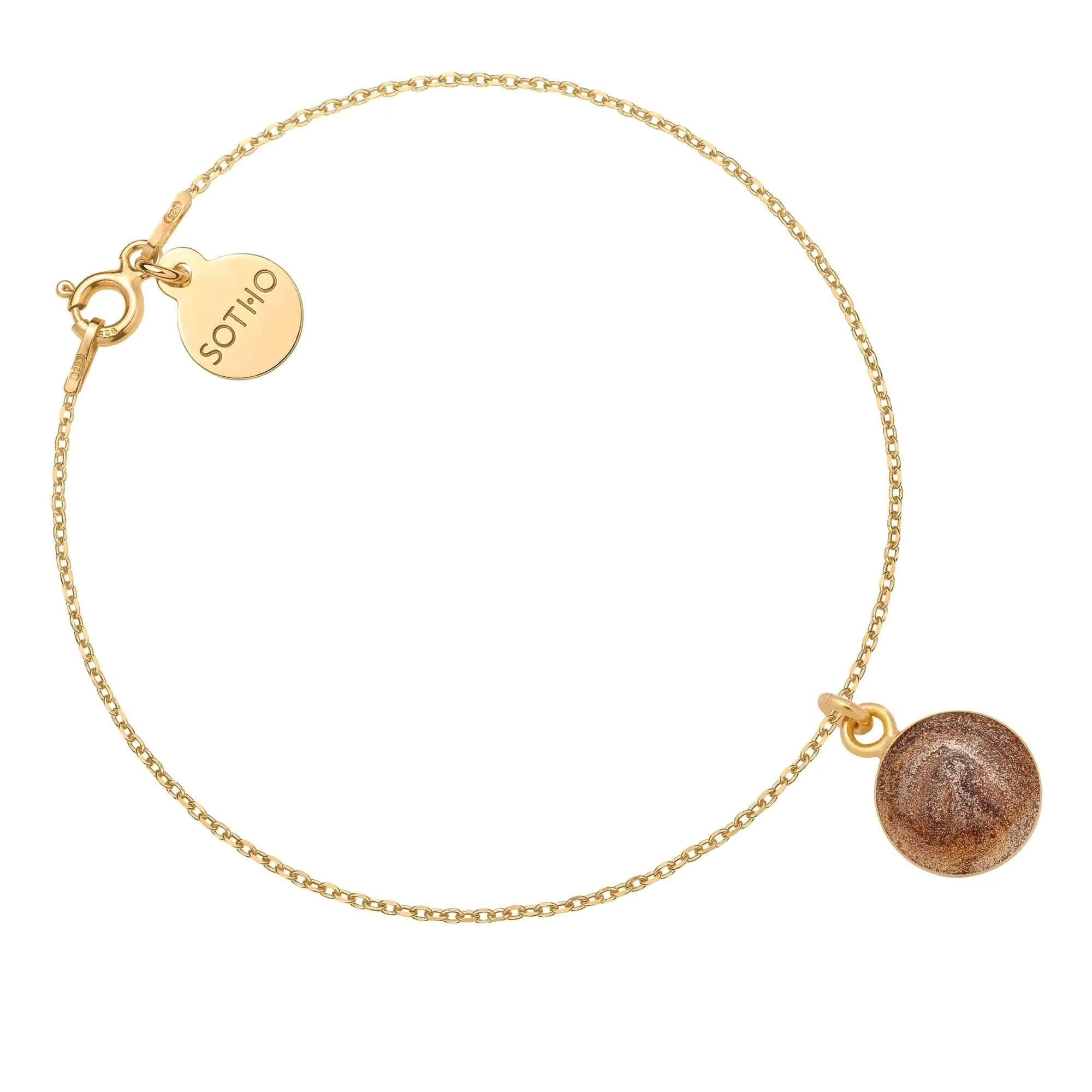 Złota bransoletka z brązową żywicą