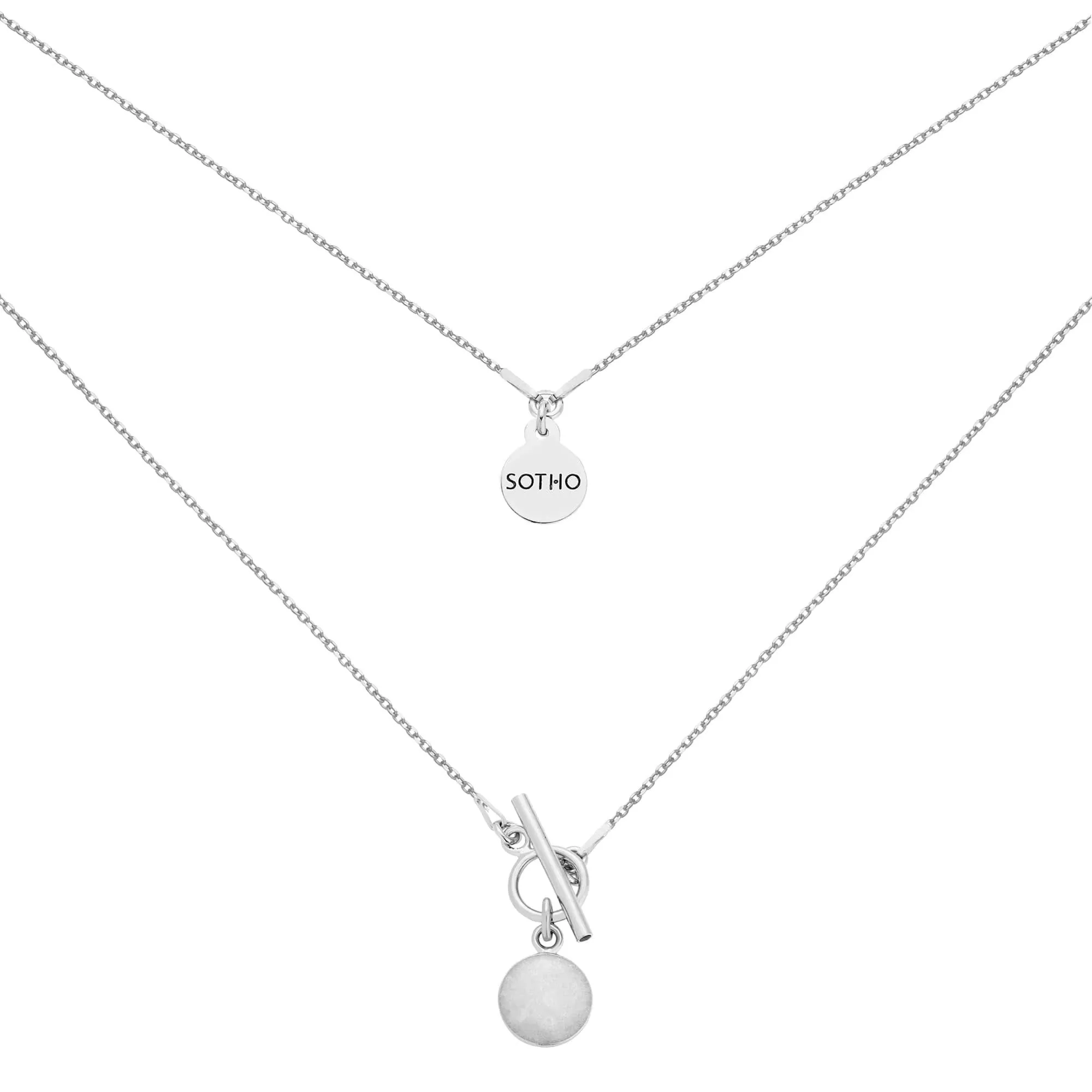 Srebrny naszyjnik z białą żywicą i ozdobnym zapięciem