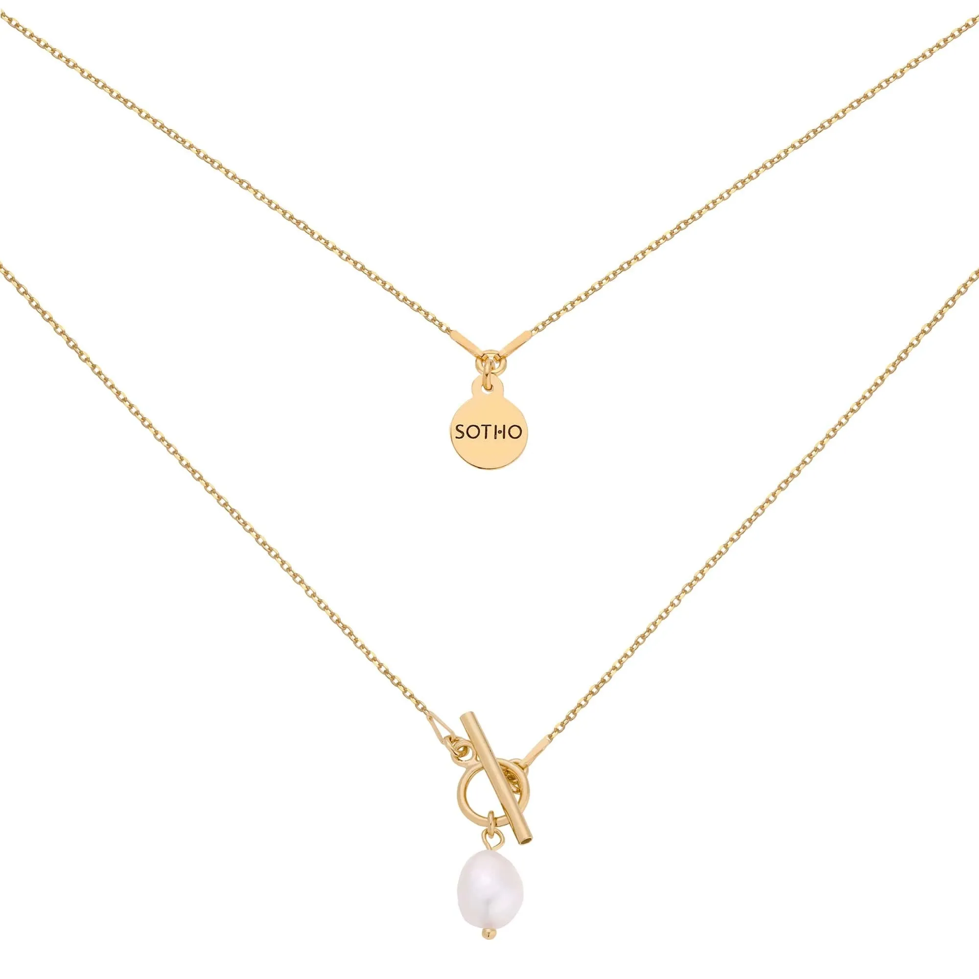 Złoty naszyjnik z ozdobnym zapięciem i naturalną perłą