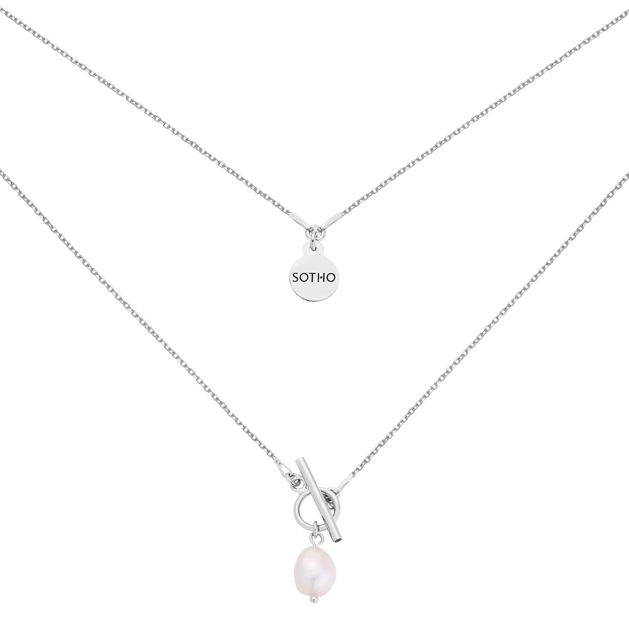 Srebrny naszyjnik z ozdobnym zapięciem i naturalną perłą