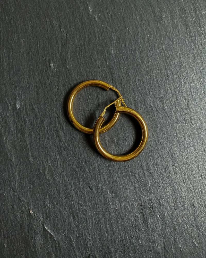 Masywne kolczyki koła M z różowego złota