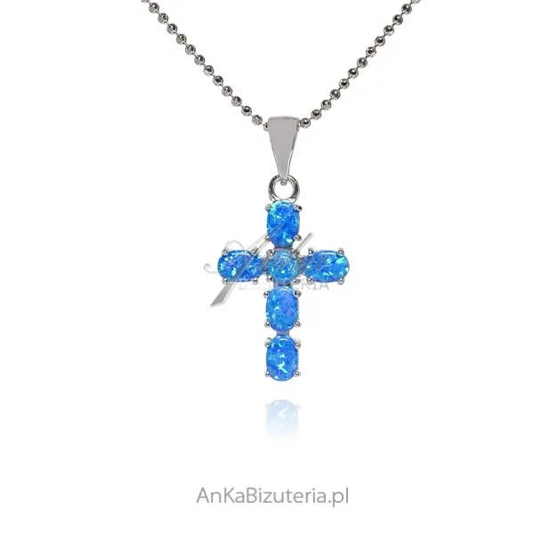 Srebrny krzyżyk z niebieskim opalem