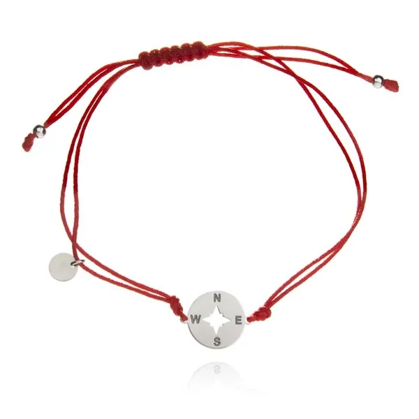 Bransoletka srebrna na czerwonym sznureczku róża wiatrów