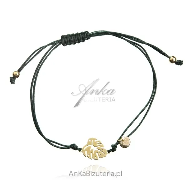 Srebrna bransoletka pozłacana  na zielonym sznurku woskowanym liść monstery