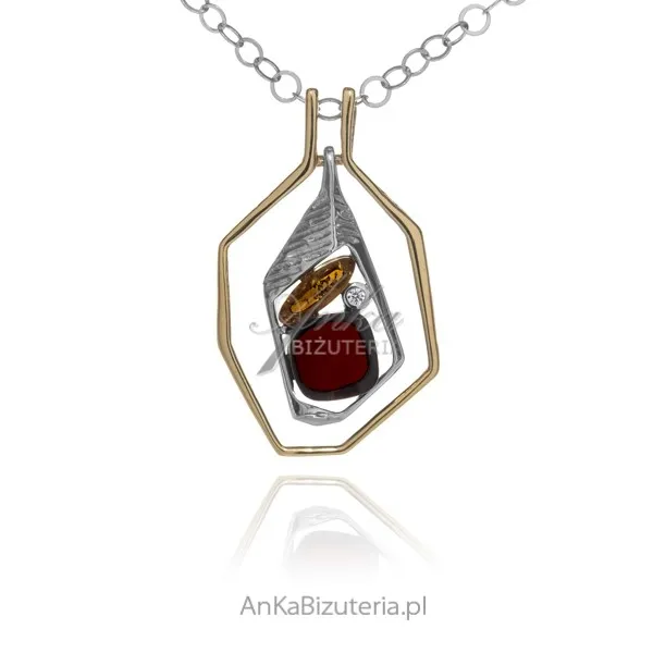 Zachwycająca zawieszka srebrna i pozłacana z wiśniowo-koniakowym bursztynem i białą cyrkonią