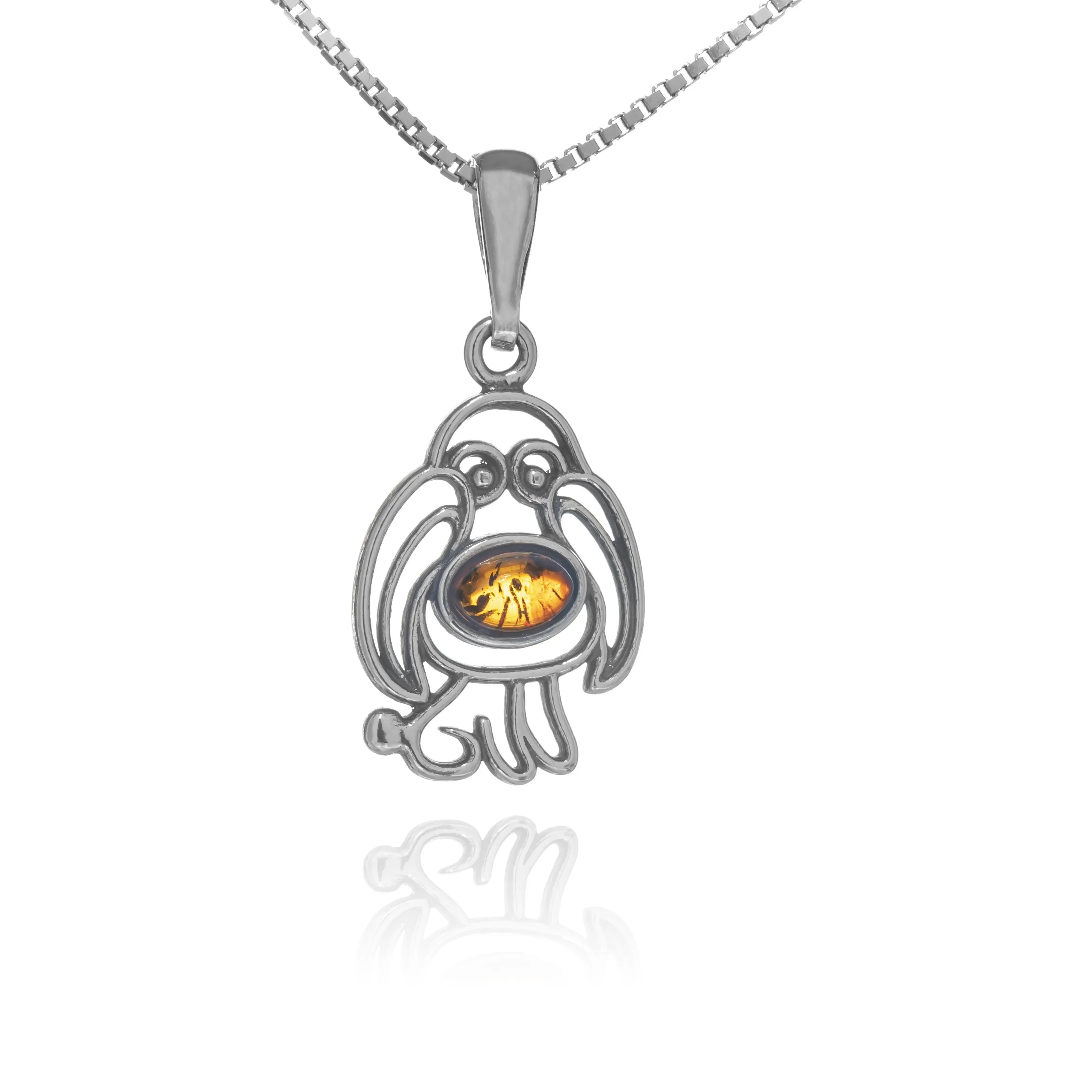 Zawieszka srebrna z bursztynem spanielek