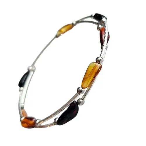 Bransoletka na metalowej sprężynce z bursztynem