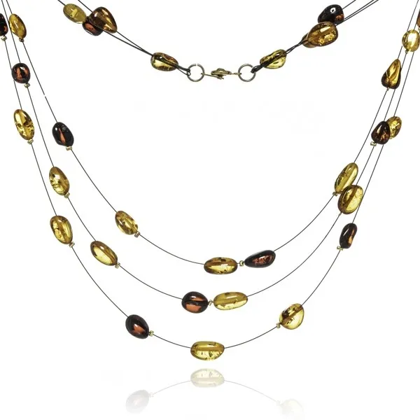 Korale z bursztynu na stalowych linkach z koniakowo - wiśniowym bursztynem