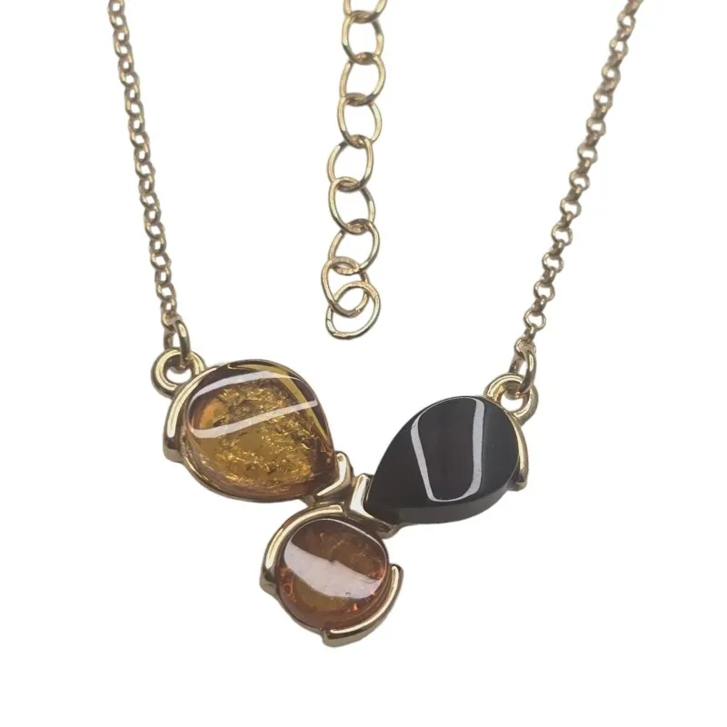 Naszyjnik srebrny pozłacany z wiśniowym i koniakowym bursztynem