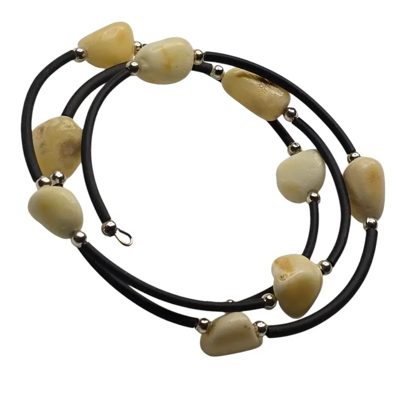 Bransoletka z biało - żółtym bursztynem na kauczukowej spiralce