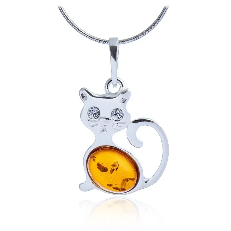 Delikatna srebrna zawieszka z bursztynem kotek