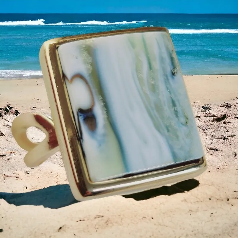 Wyjątkowy pierścionek srebrny z rzadkim biało - niebieskim bursztynem - regulowany