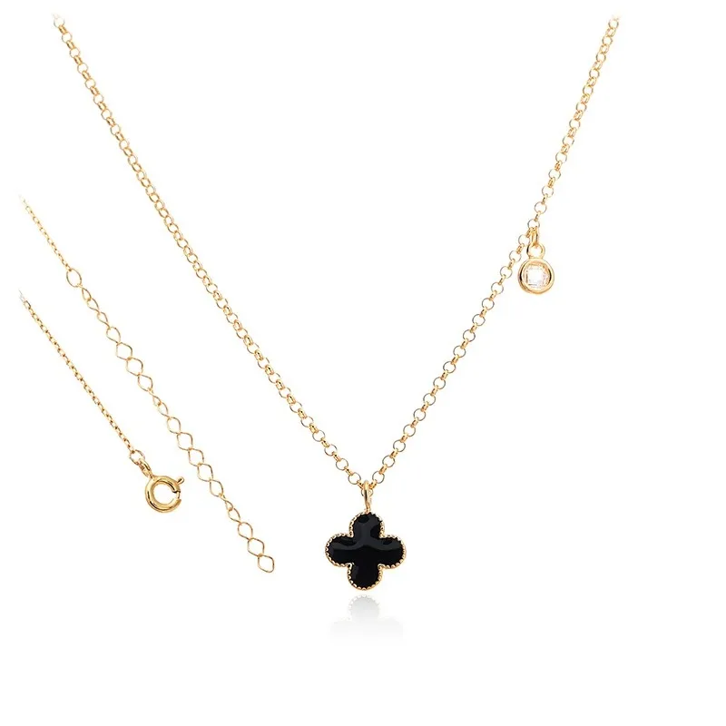 Naszyjnik srebrny pozłacany  z czarną koniczynką marokańską i białą cyrkonią