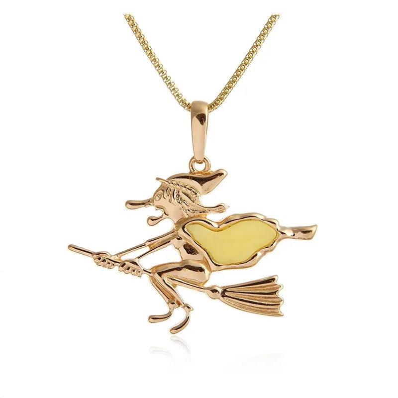 Zawieszka srebrna pozłacana z żółtym bursztynem wiedźma na miotle