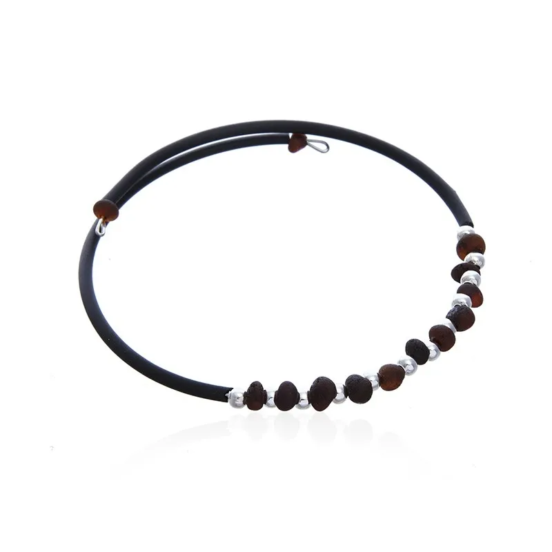 Bransoletka z koniakowym matowym  bursztynem na kauczukowej sprężynce