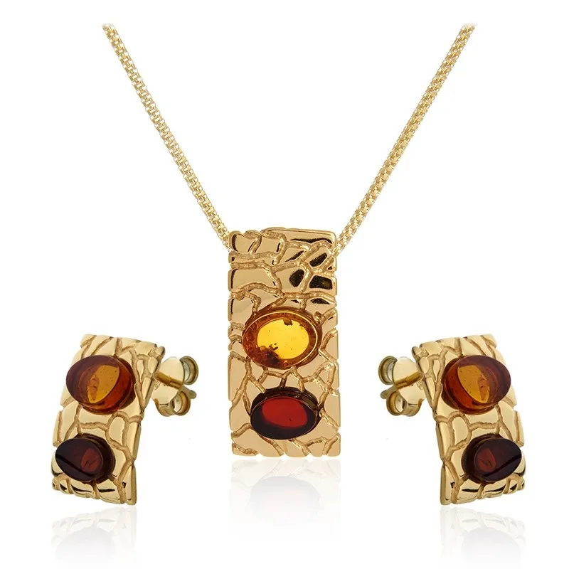 Piękny komplet pozłacany z wiśniowym i koniakowym bursztynem