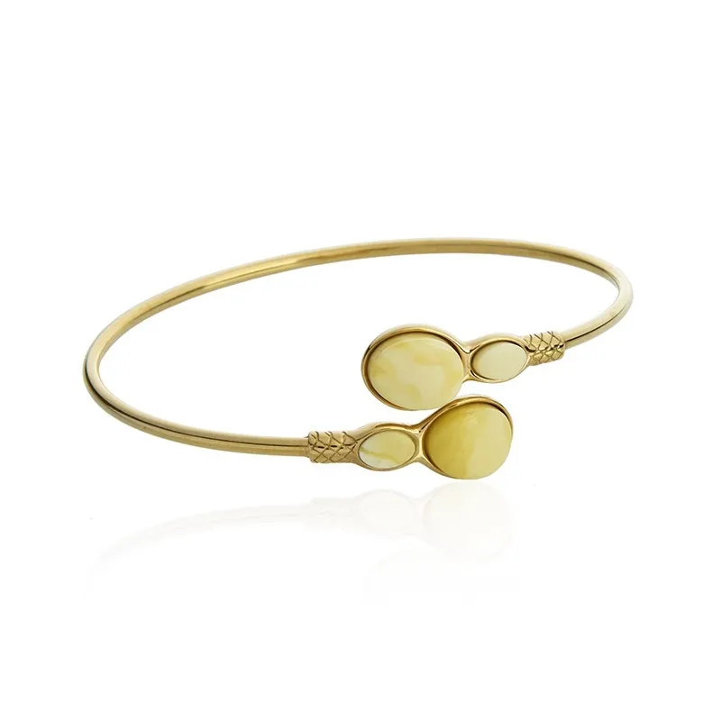 Bransoletka srebrna pozłacana  z żółto - białym bursztynem