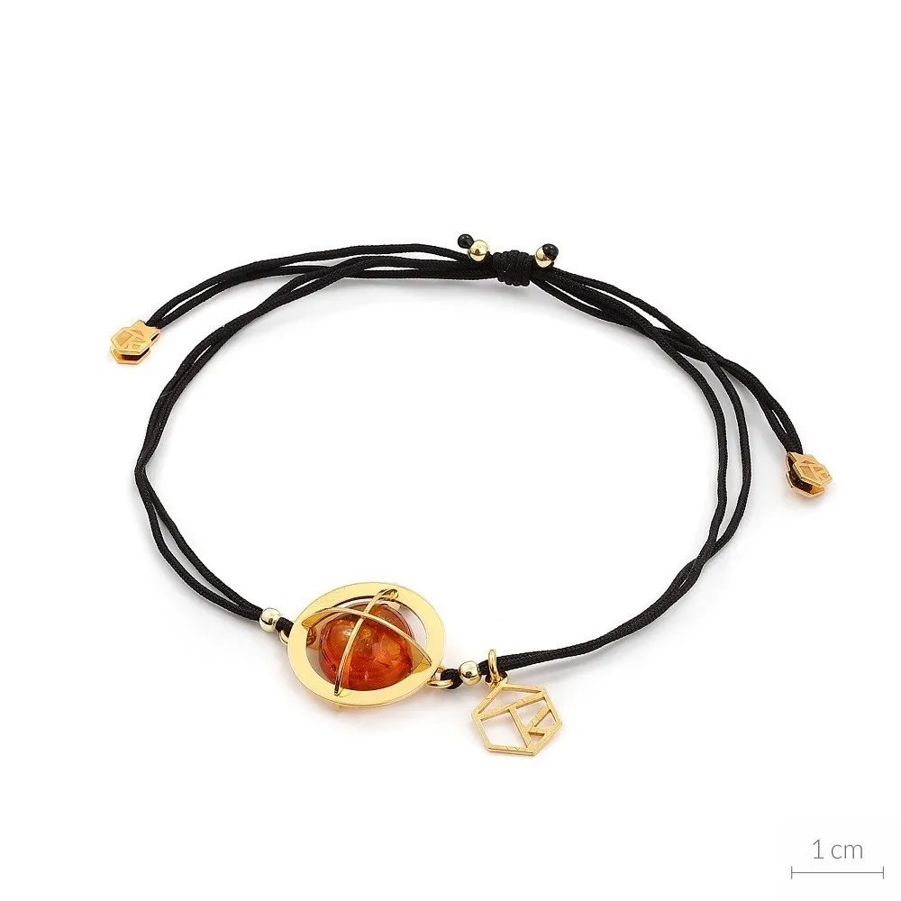 Bransoletka na czarnym sznurku z koniakowym bursztynem kopernicus