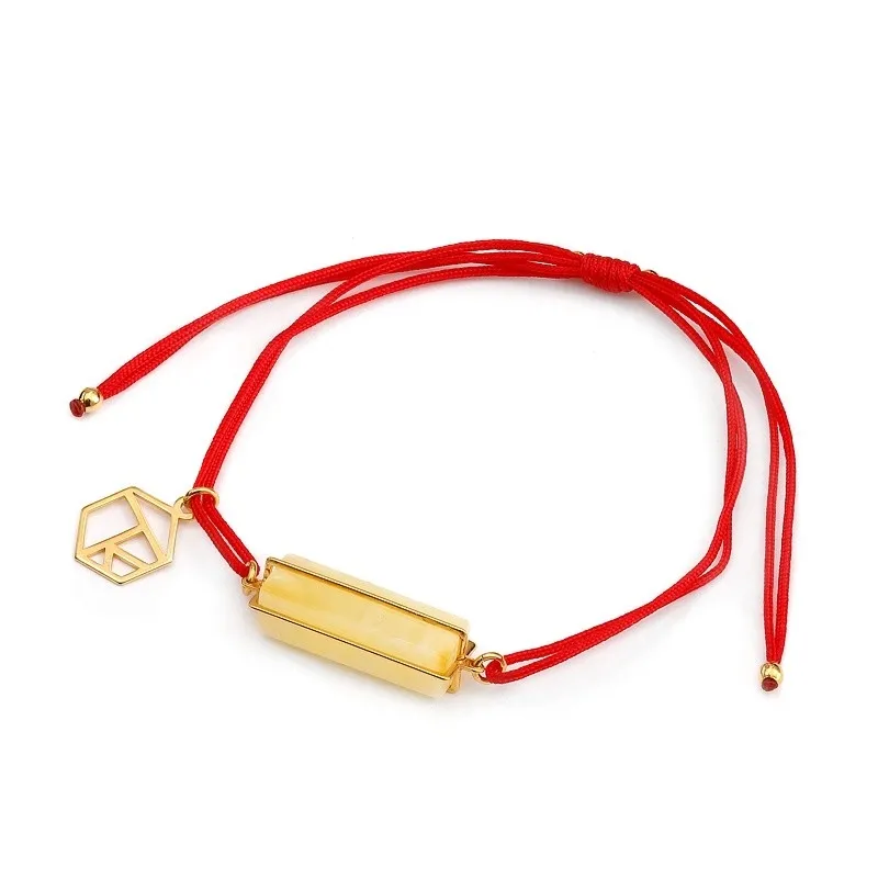 Bransoletka  srebrna na sznurku z żółtym bursztynem mikro