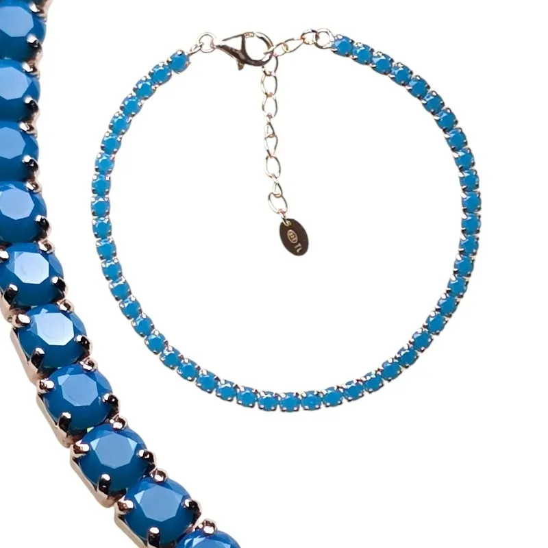 Bransoletka srebrna pozłacana z pięknymi niebieskimi cyrkoniamii