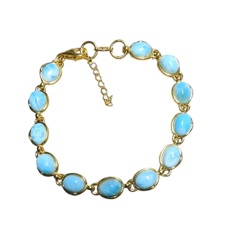 Bransoletka srebrna pozłacana  z larimarem - odkryj spokój z larimarem