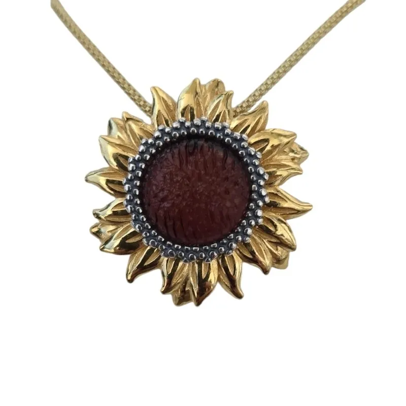 Srebrna zawieszka pozłacana z bursztynem słonecznik