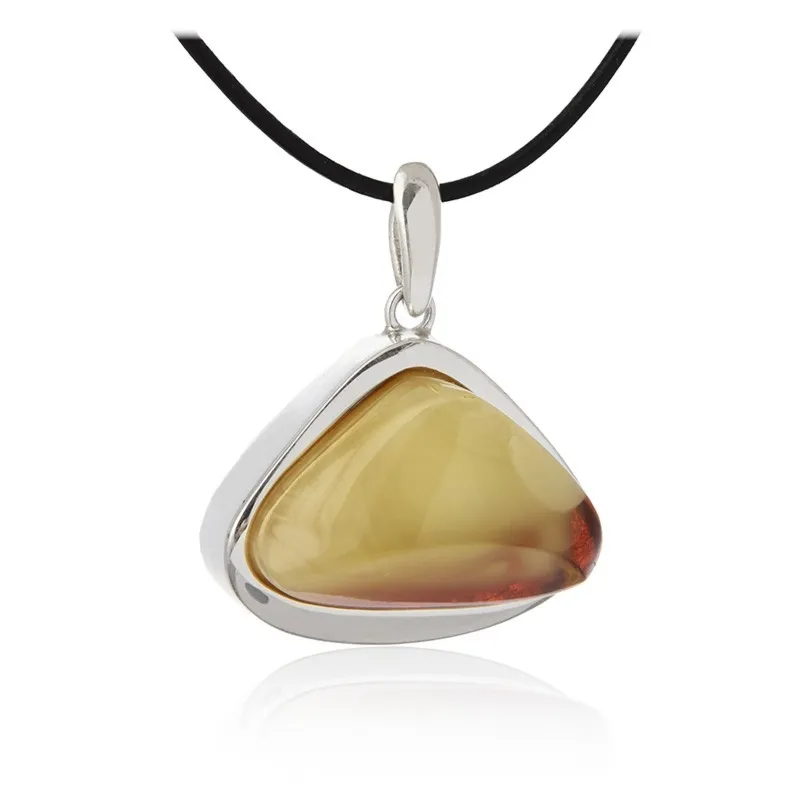 Srebrna zawieszka z bursztynem „trójkąt słońca” – biżuteria artystyczna