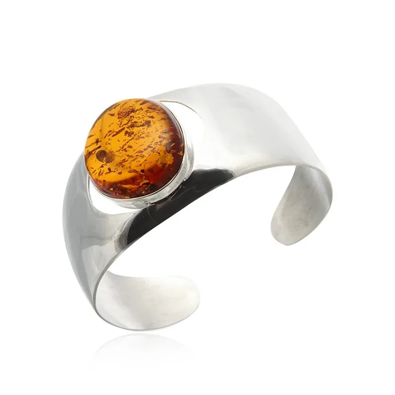 Zegarkowa bransoletka srebrna z dużym koniakowym bursztynem