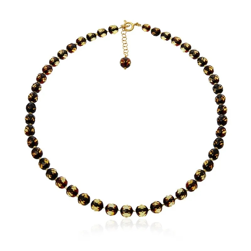 Naszyjnik srebrny pozłacany z zielonym fasetowanym bursztynem