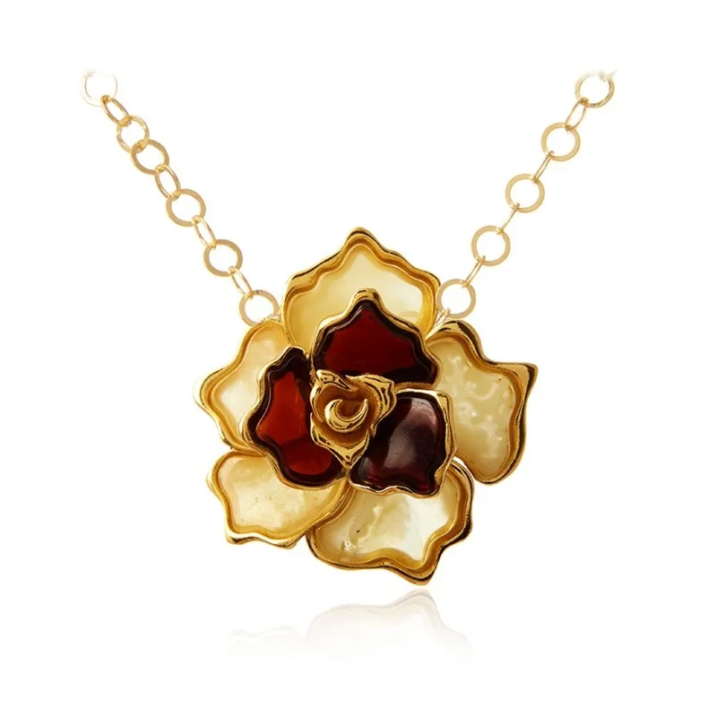Śliczna zawieszka srebrna pozłavana róza z wiśniowym i żółtym bursztynem