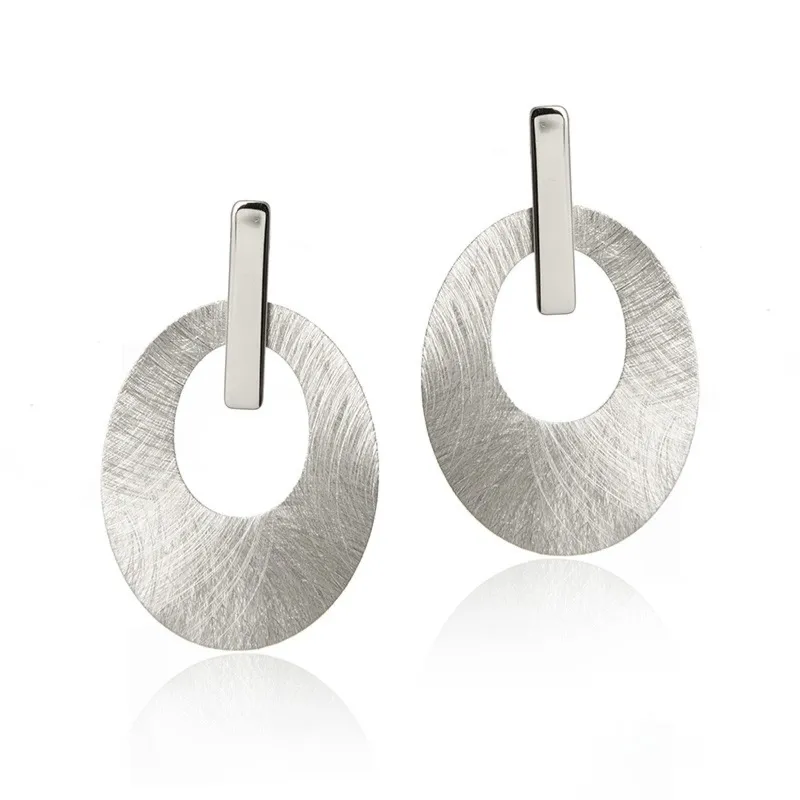 Kolczyki srebrne satynowane owalne - kolczyki na 3 sposoby