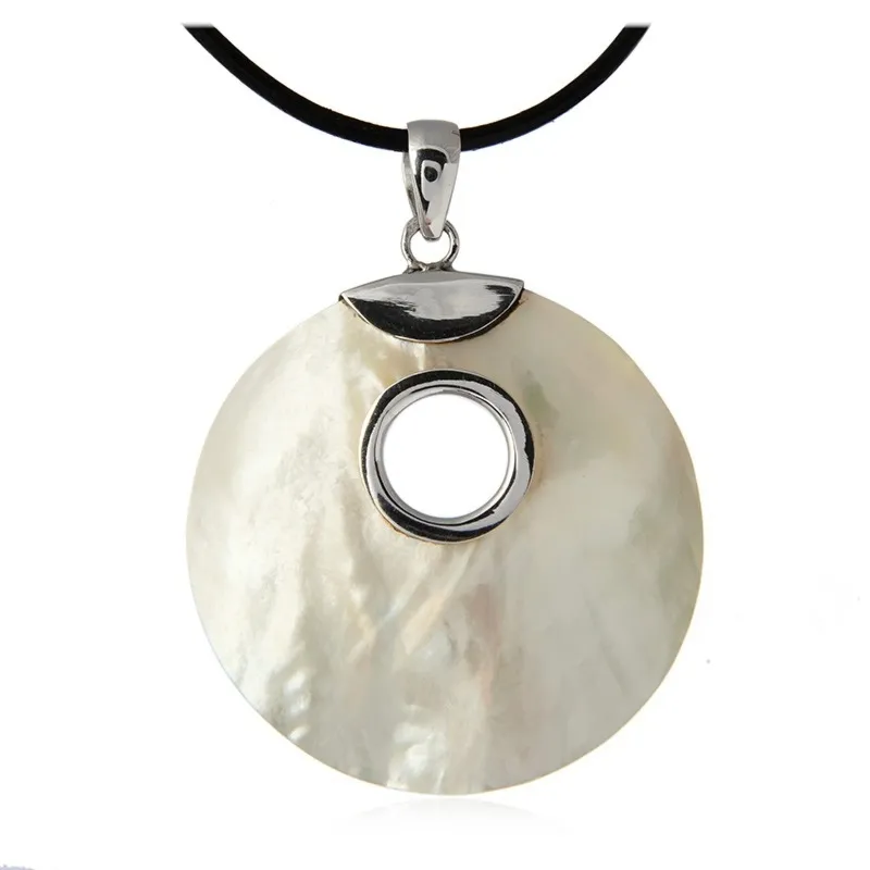 Srebrna zawieszka z muszlą paola