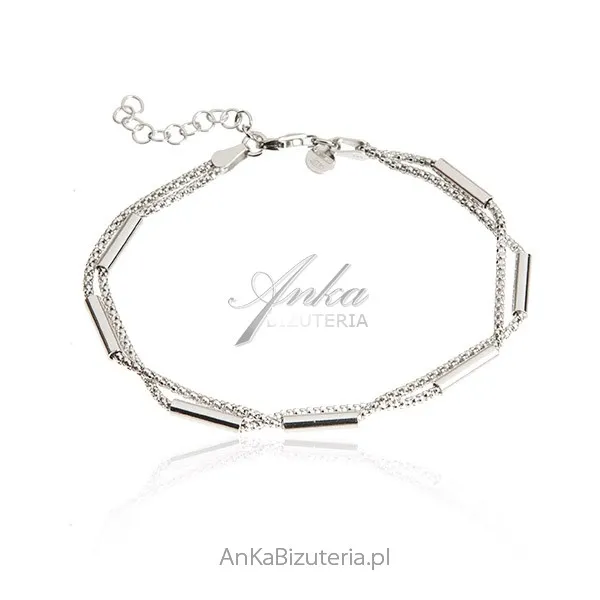 Srebrna bransoletka  z pałeczkami