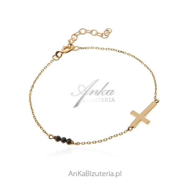 Bransoletka srebrna pozłacana z czarnym onyksem krzyżyk