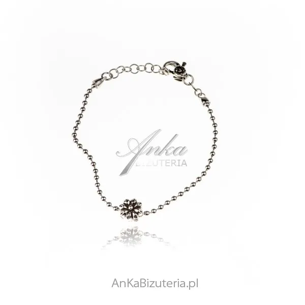 Bransoletka srebrna  kuleczki z kwiatkiem oksydowana