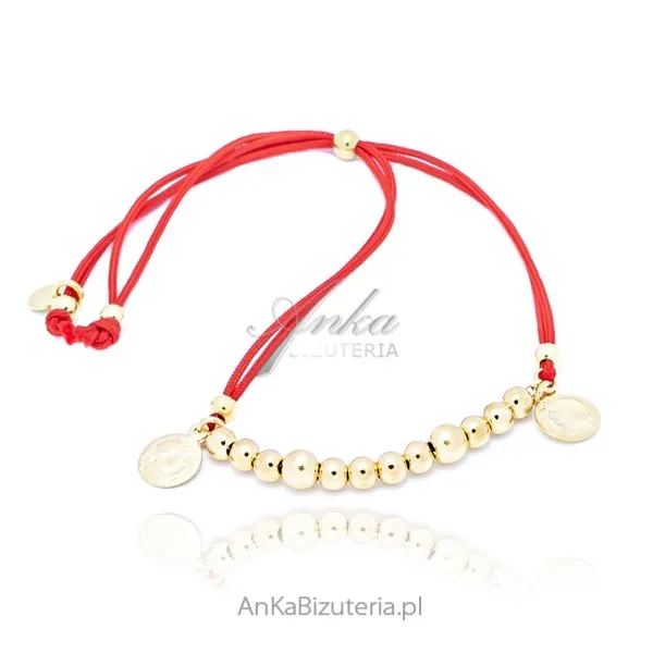 Bransoletka srebrna na czerwonym sznureczku z monetami