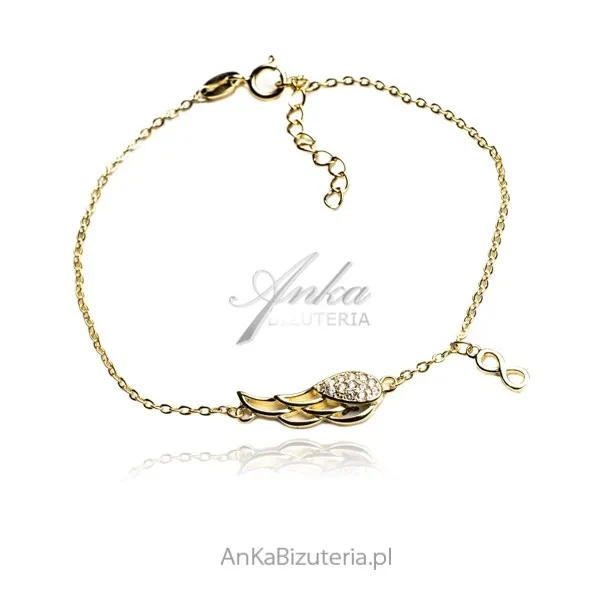 Bransoletka  srebrna pozłacana z cyrkoniami skrzydło anioła z nieskończonością