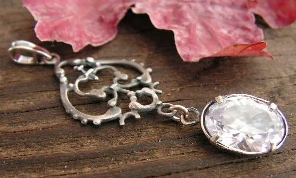 RIVOIRI - srebrny wisiorek z kryształem Swarovskiego