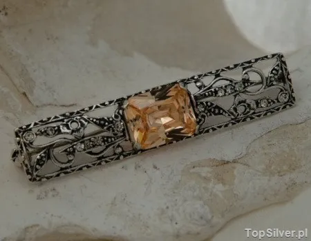 ALEROS - srebrna broszka z topazem złocistym