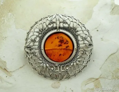 COMO - srebrna ażurowa broszka z bursztynem