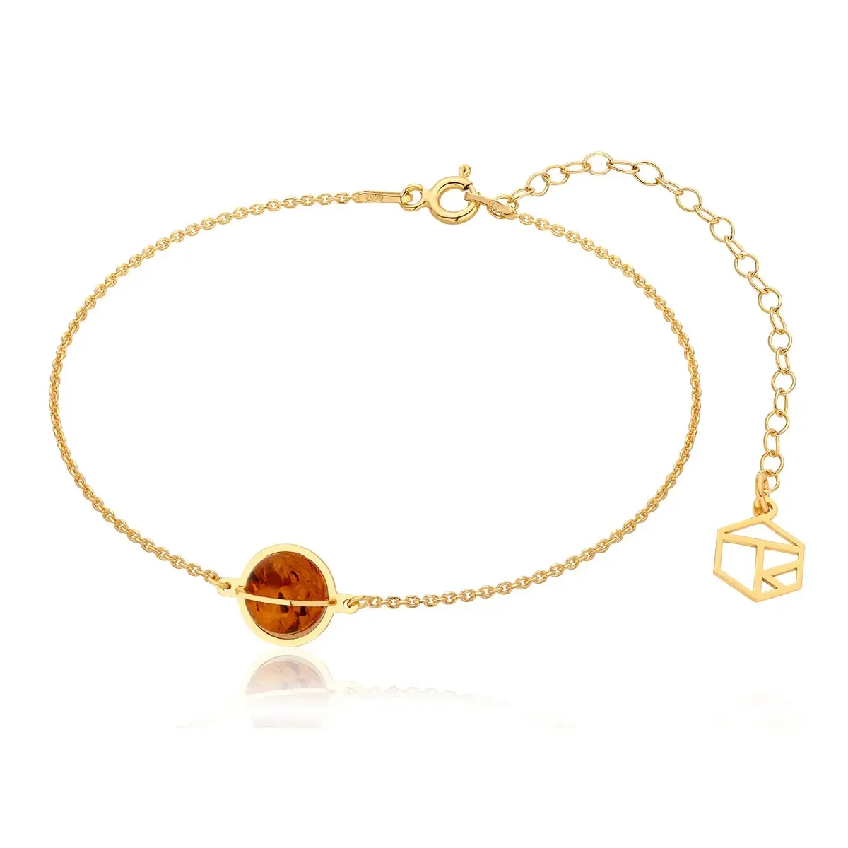 Bransoletka srebrna pozłacana z koniakowym bursztynem kulka