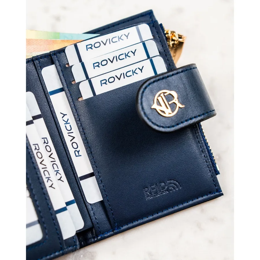 Granatowy portfel damski ze skóry ekologicznej zamykany na zatrzask i suwak - Rovicky