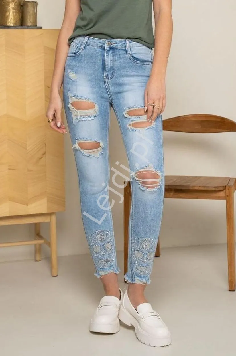 Niebieskie jeansy damskie z kryształkowymi czaszkami 2386