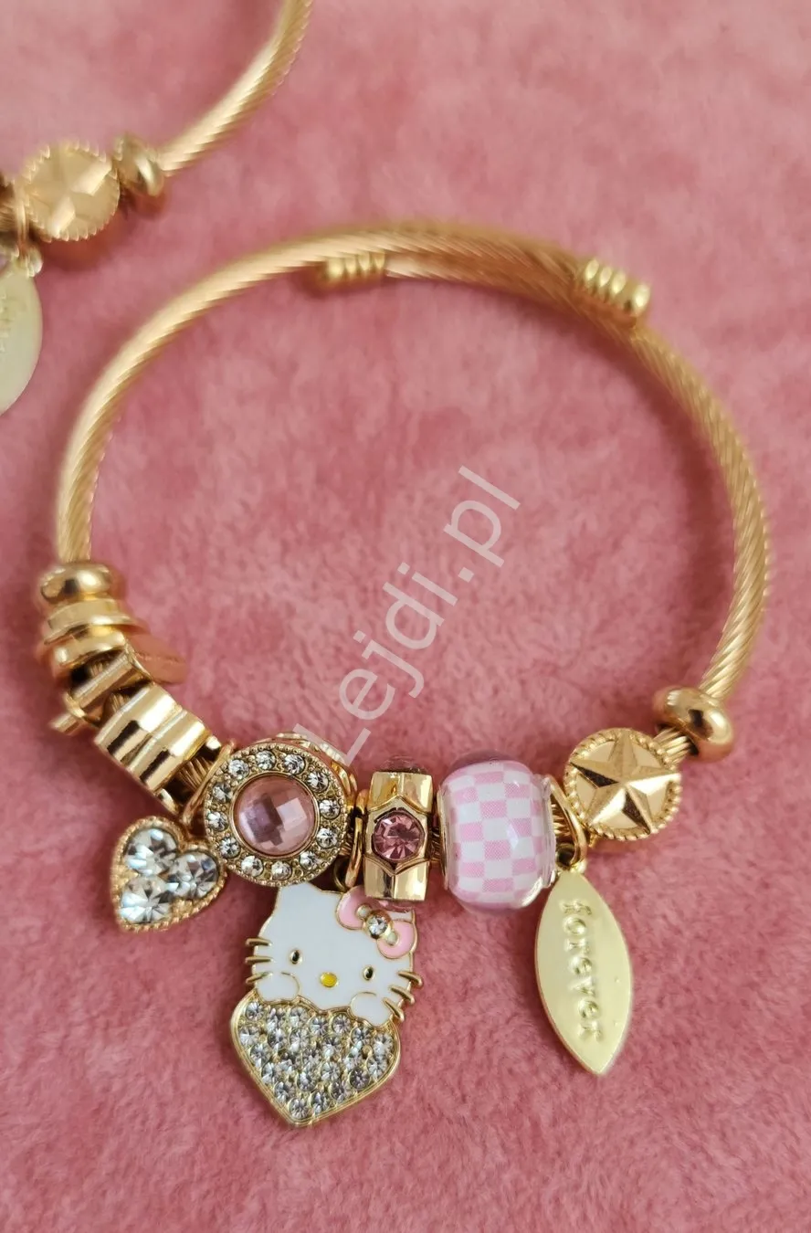 Bransoletka Hello Kitty w kolorze złotym z kotkiem i motylkiem