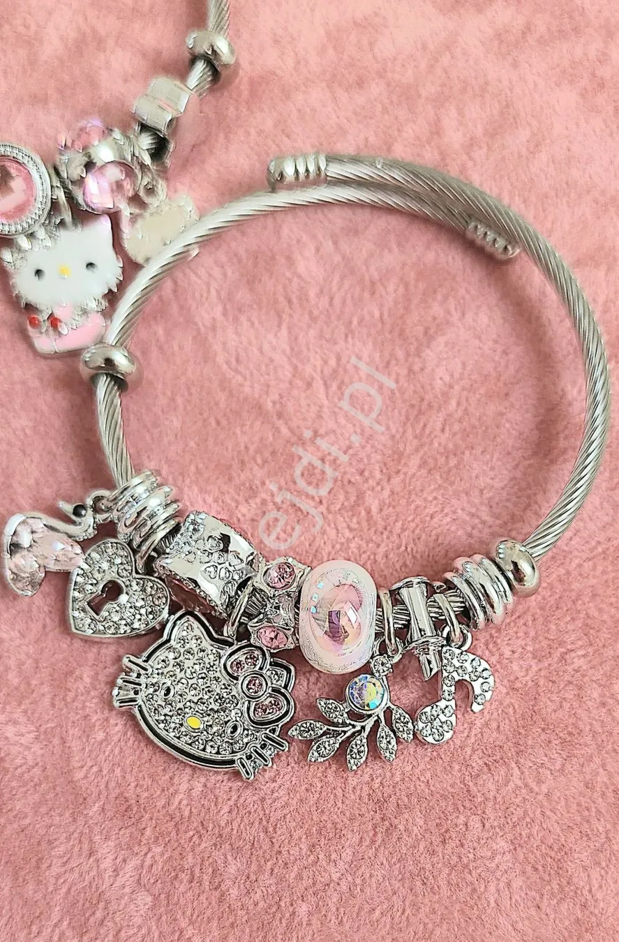 Bransoletka Hello Kitty w kolorze srebrnym z kotkiem, nutką, listkiem, dziurka od klucza, łabędziem