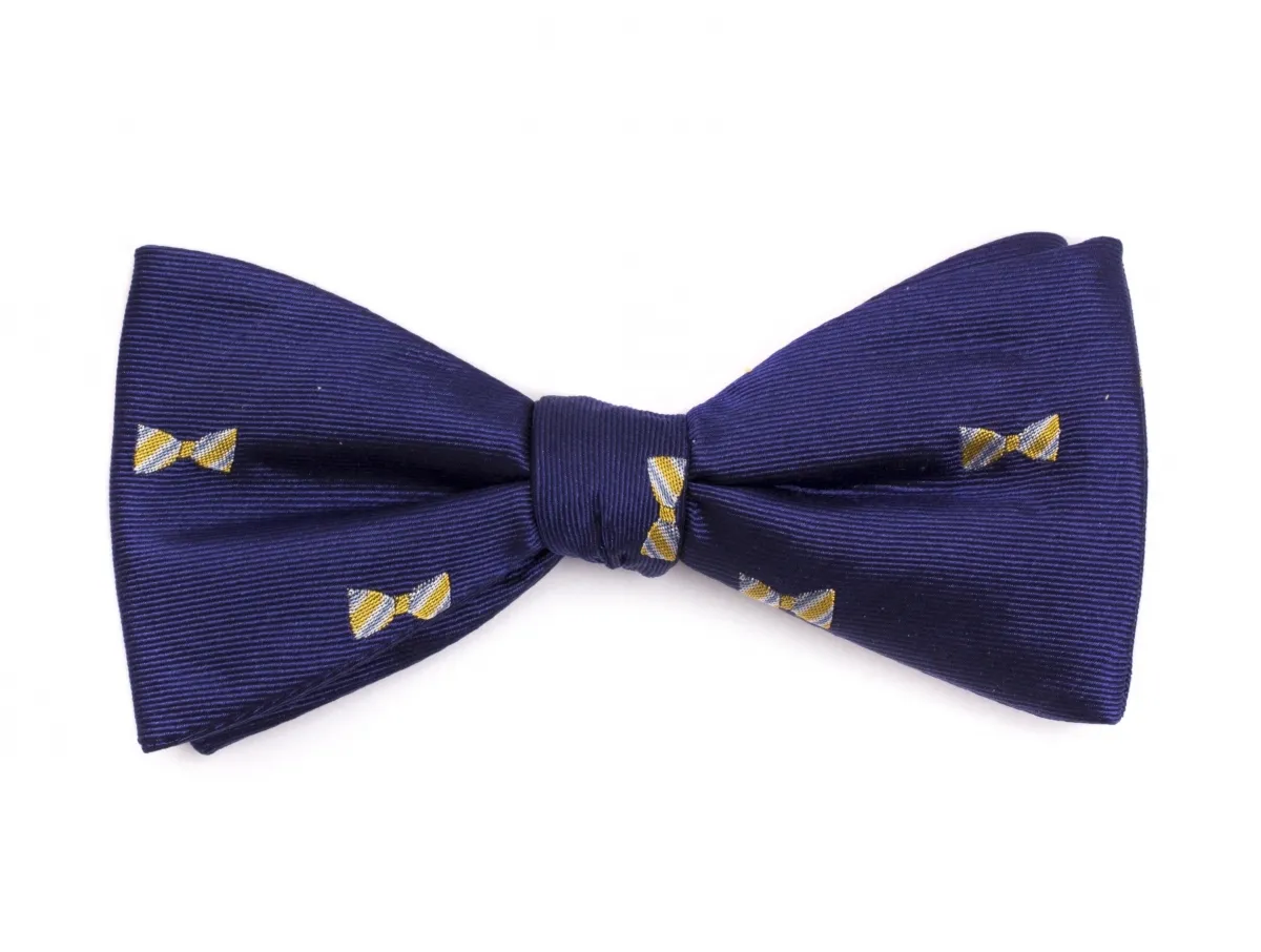 Jedwabna ciemnoniebieska mucha wiązana w żółte muszki