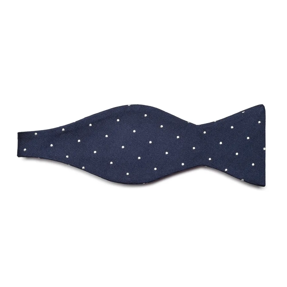 Elegancka granatowa mucha wiązana w białe kropki