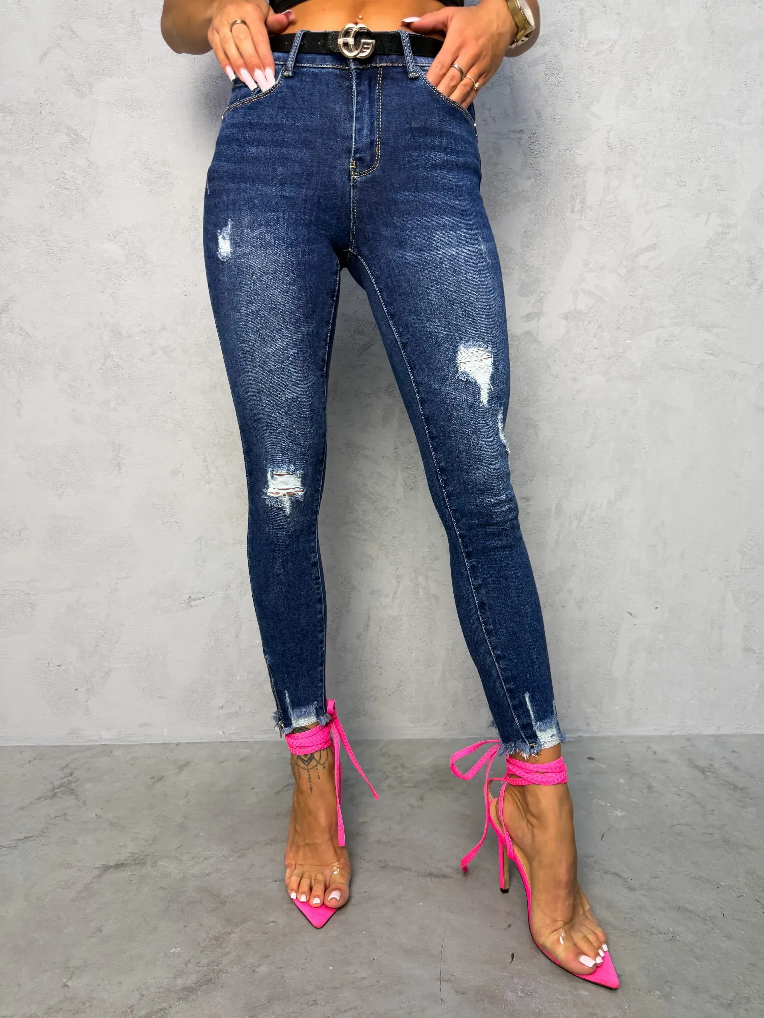 Spodnie jeansowe z przetarciami granatowe 110A (Wariant rozmiar + kolor: L; Kolor: Niebieski)