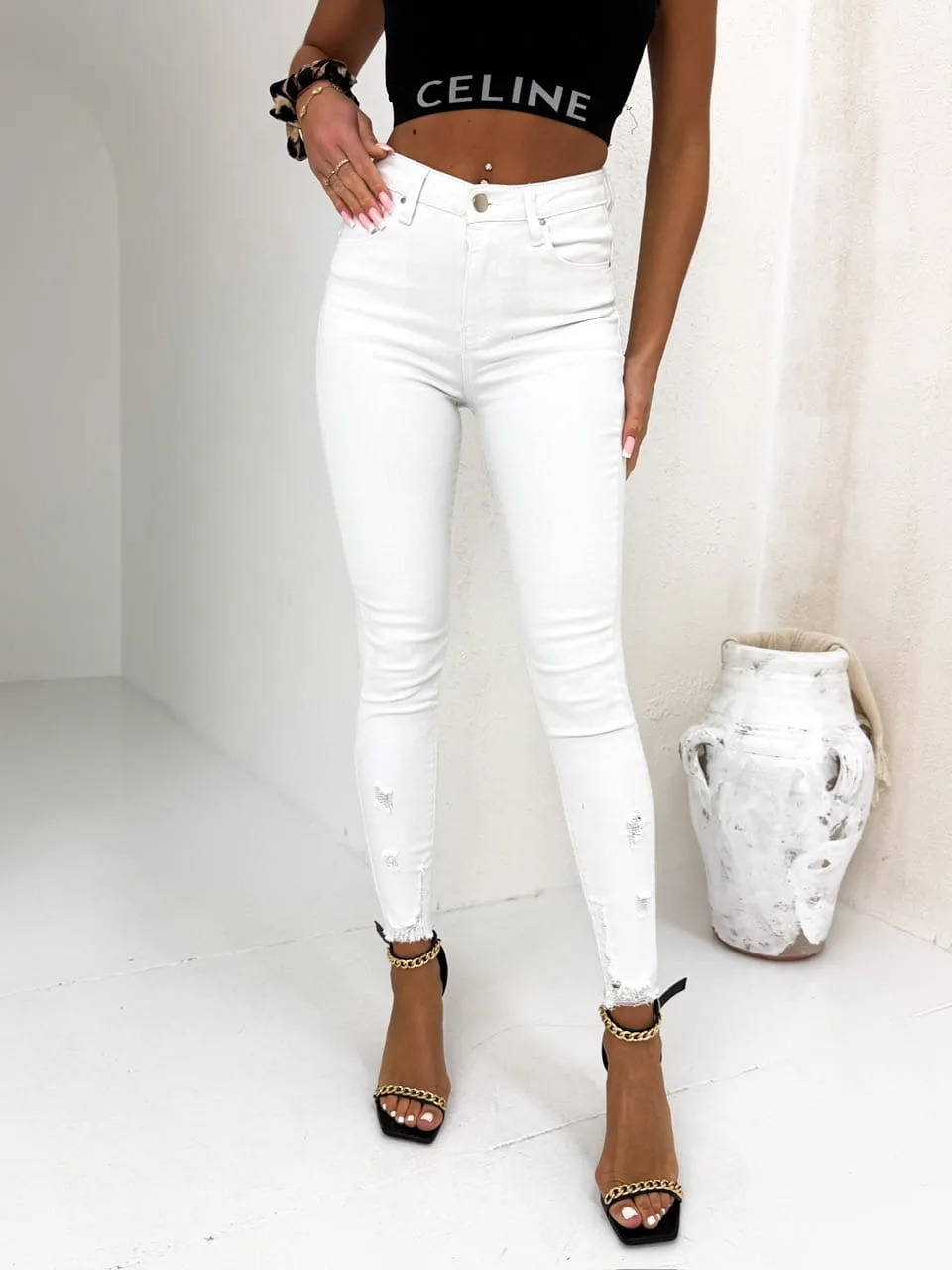 Spodnie z poszarpaną nogawką białe 4A (Wariant rozmiar + kolor: L; Kolor: Biały)